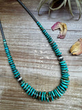 22 inch Graduated Green necklace with Sterling silver pearls