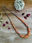 22 Inch orange spiny, hematite and sterling silver pearls