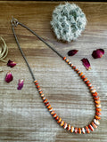 22 Inch orange spiny and sterling silver pearls