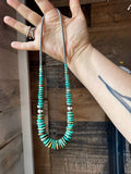 22 inch Graduated Green necklace with Sterling silver pearls